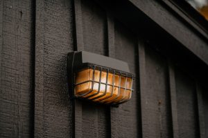 Photo Wabi-Sabi Style Travertine Cylindrical Zipper Wall Lamp